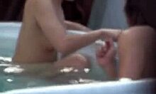 Lovely Japanese girl makes love to her man in bath
