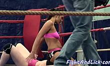 Muscular women dominate and wrestle in a boxing ring